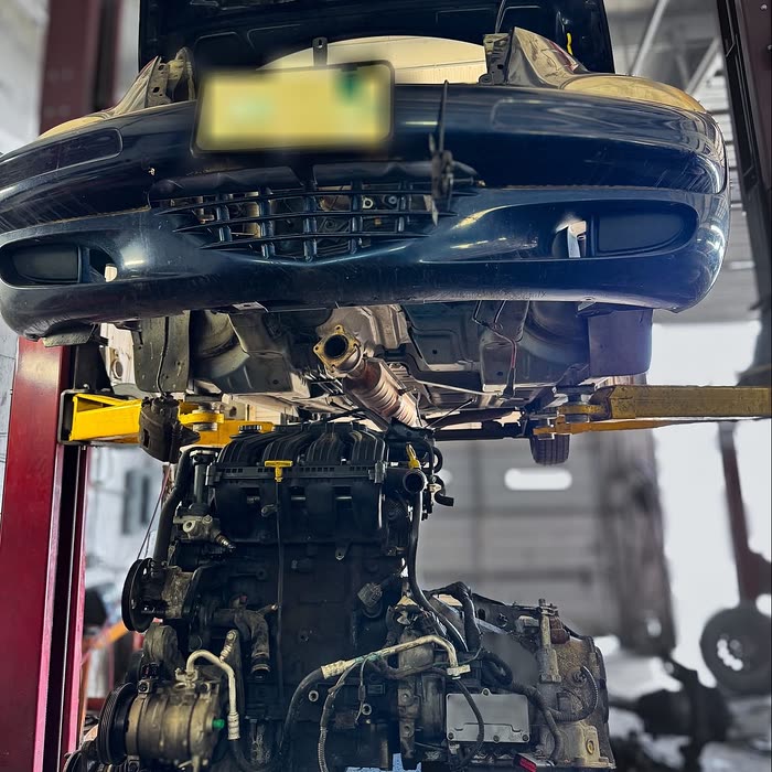 An engine out of the vehicle in a Garrett Automotive bay